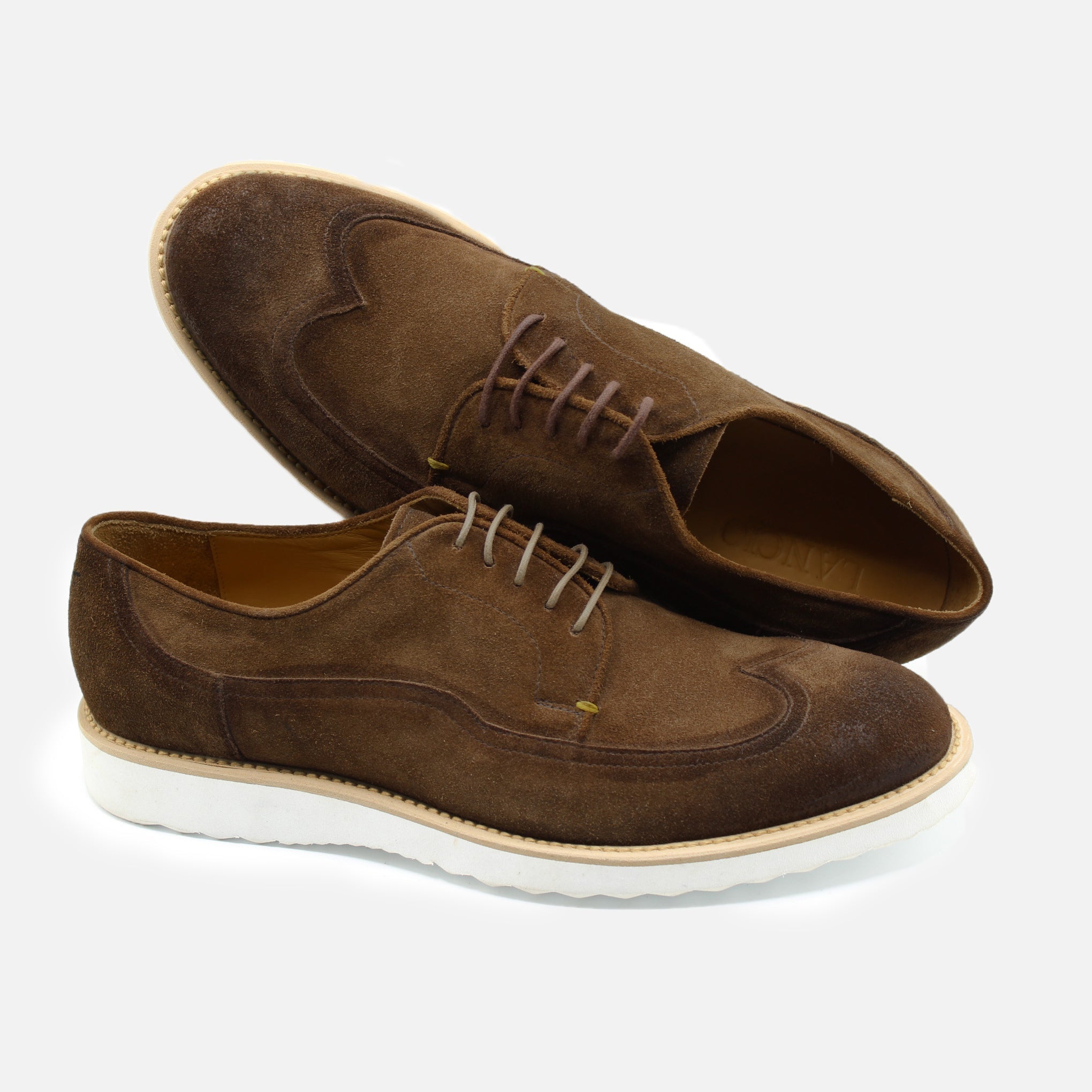 Quali materiali compongono una scarpa artigianale ?